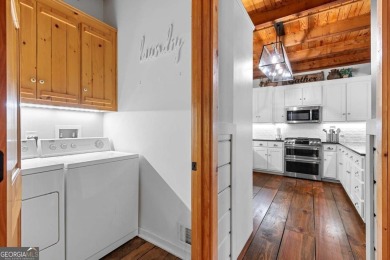 A tastefully and fully renovated home, located on a rushing on Bent Tree Golf Course in Georgia - for sale on GolfHomes.com, golf home, golf lot