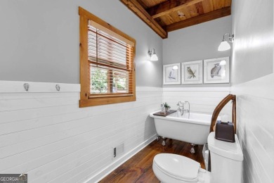 A tastefully and fully renovated home, located on a rushing on Bent Tree Golf Course in Georgia - for sale on GolfHomes.com, golf home, golf lot