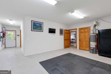 A tastefully and fully renovated home, located on a rushing on Bent Tree Golf Course in Georgia - for sale on GolfHomes.com, golf home, golf lot