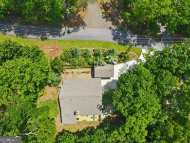 A tastefully and fully renovated home, located on a rushing on Bent Tree Golf Course in Georgia - for sale on GolfHomes.com, golf home, golf lot