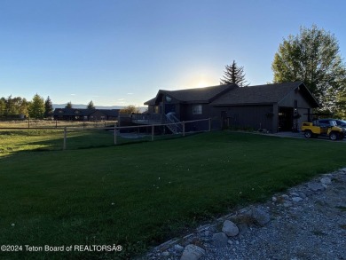 11 Last Chance Circle, a beautifully landscaped home in the on Cedar Creek Golf Course in Wyoming - for sale on GolfHomes.com, golf home, golf lot