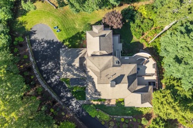 This architecturally designed home is sited to blend with the on  in Massachusetts - for sale on GolfHomes.com, golf home, golf lot