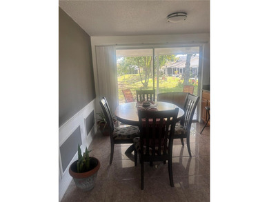 Welcome to this charming waterfront-view 2-bedroom, 2-bath on Beacon Woods Golf Club in Florida - for sale on GolfHomes.com, golf home, golf lot