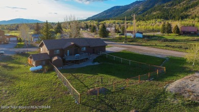 11 Last Chance Circle, a beautifully landscaped home in the on Cedar Creek Golf Course in Wyoming - for sale on GolfHomes.com, golf home, golf lot