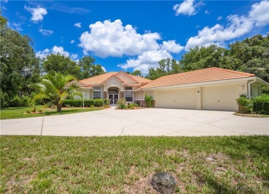 Check out this lavish 4- bedroom, 2.5-bath, 3-car garage home at on Twisted Oaks Golf Club in Florida - for sale on GolfHomes.com, golf home, golf lot