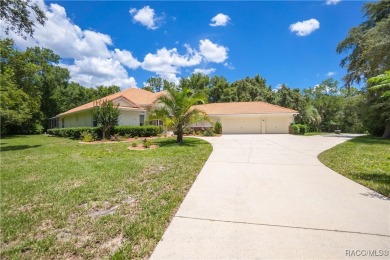 Check out this lavish 4- bedroom, 2.5-bath, 3-car garage home at on Twisted Oaks Golf Club in Florida - for sale on GolfHomes.com, golf home, golf lot