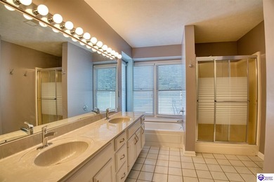 Nestled across from the fairway of the Heartland Golf Club, this on Pine Valley Golf Resort in Kentucky - for sale on GolfHomes.com, golf home, golf lot