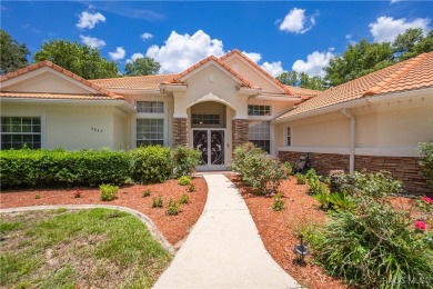 Check out this lavish 4- bedroom, 2.5-bath, 3-car garage home at on Twisted Oaks Golf Club in Florida - for sale on GolfHomes.com, golf home, golf lot