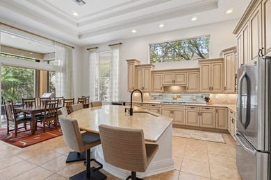 Beautiful single-story home on desirable Via Paradisio in on Country Club At Mirasol in Florida - for sale on GolfHomes.com, golf home, golf lot