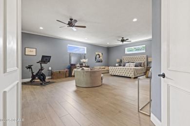 AWARD WINNING LANDSCAPING! Step into elevated Florida living on Halifax Plantation Golf Club in Florida - for sale on GolfHomes.com, golf home, golf lot