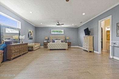 AWARD WINNING LANDSCAPING! Step into elevated Florida living on Halifax Plantation Golf Club in Florida - for sale on GolfHomes.com, golf home, golf lot