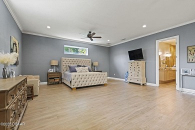 AWARD WINNING LANDSCAPING! Step into elevated Florida living on Halifax Plantation Golf Club in Florida - for sale on GolfHomes.com, golf home, golf lot