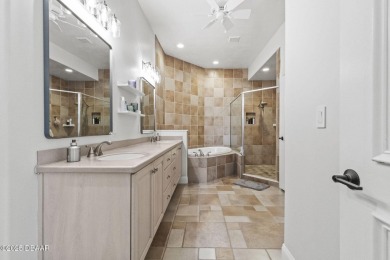 AWARD WINNING LANDSCAPING! Step into elevated Florida living on Halifax Plantation Golf Club in Florida - for sale on GolfHomes.com, golf home, golf lot