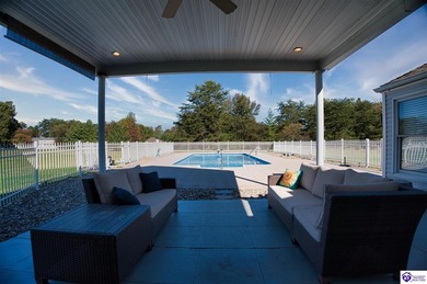 Nestled across from the fairway of the Heartland Golf Club, this on Pine Valley Golf Resort in Kentucky - for sale on GolfHomes.com, golf home, golf lot