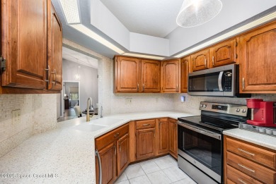 This charming expanded Madison model is located in a on Indian River Colony Club in Florida - for sale on GolfHomes.com, golf home, golf lot