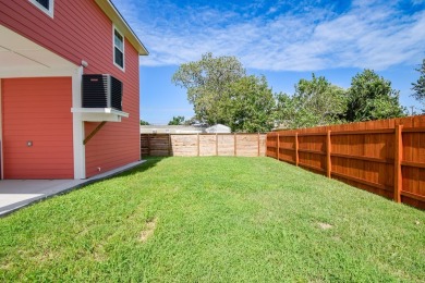 The home is elevated on pilings to allow for covered parking and on Rockport Country Club in Texas - for sale on GolfHomes.com, golf home, golf lot