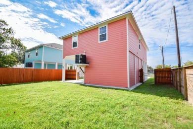 The home is elevated on pilings to allow for covered parking and on Rockport Country Club in Texas - for sale on GolfHomes.com, golf home, golf lot