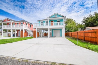 The home is elevated on pilings to allow for covered parking and on Rockport Country Club in Texas - for sale on GolfHomes.com, golf home, golf lot