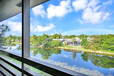 Welcome to this unique 2-bedroom, 2-bathroom corner unit on the on Sunrise Lakes Phase IV Golf Course in Florida - for sale on GolfHomes.com, golf home, golf lot