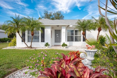 Situated in the desirable Gardens of Gulf Cove, this CANAL-FRONT on Duffys Golf Center in Florida - for sale on GolfHomes.com, golf home, golf lot