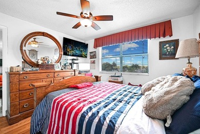 Welcome to this unique 2-bedroom, 2-bathroom corner unit on the on Sunrise Lakes Phase IV Golf Course in Florida - for sale on GolfHomes.com, golf home, golf lot