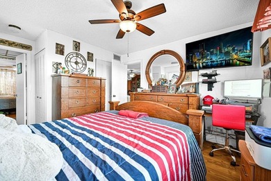 Welcome to this unique 2-bedroom, 2-bathroom corner unit on the on Sunrise Lakes Phase IV Golf Course in Florida - for sale on GolfHomes.com, golf home, golf lot