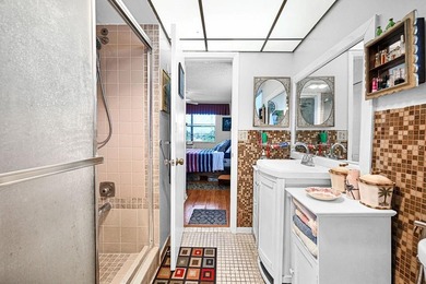 Welcome to this unique 2-bedroom, 2-bathroom corner unit on the on Sunrise Lakes Phase IV Golf Course in Florida - for sale on GolfHomes.com, golf home, golf lot