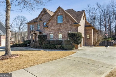 Welcome to your completely renovated haven in coveted Woodmont on Woodmont Golf and Country Club in Georgia - for sale on GolfHomes.com, golf home, golf lot