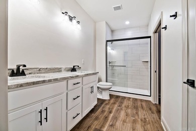 Experience effortless living in these brand-new patio homes on Big Creek Golf and Country Club in Arkansas - for sale on GolfHomes.com, golf home, golf lot