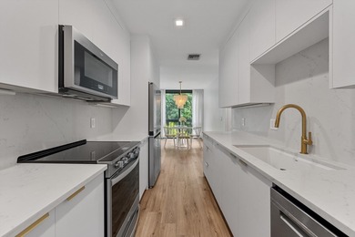 Beautifully renovated and move-in ready, this 3-bedroom, 3-bath on Palm Beach Polo and Country Club in Florida - for sale on GolfHomes.com, golf home, golf lot