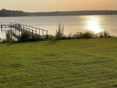 Walk out the back door and straight into Lake Nocona! You could on Nocona Hills Golf Course in Texas - for sale on GolfHomes.com, golf home, golf lot