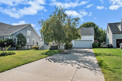 Slide into this stunning home in the sought-after Edgewater on Harbour Shores Golf Course in Michigan - for sale on GolfHomes.com, golf home, golf lot