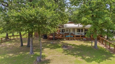 Sit back on your covered porch and soak in the breathtaking on Links At Lands End in Texas - for sale on GolfHomes.com, golf home, golf lot