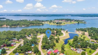 Sit back on your covered porch and soak in the breathtaking on Links At Lands End in Texas - for sale on GolfHomes.com, golf home, golf lot