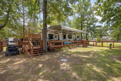 Sit back on your covered porch and soak in the breathtaking on Links At Lands End in Texas - for sale on GolfHomes.com, golf home, golf lot