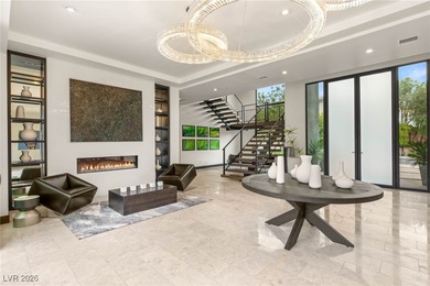 Tucked behind the gates of MacDonald Highlands, this exquisite on Dragon Ridge Country Club in Nevada - for sale on GolfHomes.com, golf home, golf lot