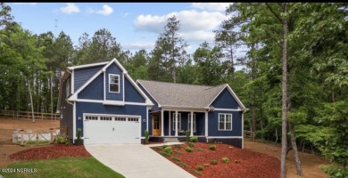 Impeccably maintained, this exquisite home resides on a tranquil on Foxfire Golf and Country Club in North Carolina - for sale on GolfHomes.com, golf home, golf lot