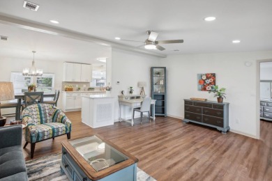 I present a beautifully renovated split floor plan two-bedroom on The Meadows At Countrywood in Florida - for sale on GolfHomes.com, golf home, golf lot