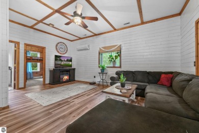 Nestled in an idyllic setting, this Barndominium home boasts on Lakes of the North Deer Run Golf Course in Michigan - for sale on GolfHomes.com, golf home, golf lot