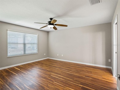 Beautifully maintained 2017 Amarillo model located just a block on El Diablo Executive Golf Course in Florida - for sale on GolfHomes.com, golf home, golf lot