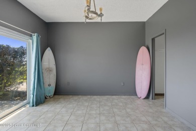 Wake up to the sound of waves in this 3-story, 3 bed, 3 bath on Spessard Holland Golf Course in Florida - for sale on GolfHomes.com, golf home, golf lot