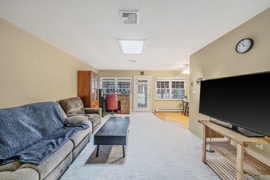 This beautifully maintained Greenbriar model is located in a on Leisure Village Golf Course in New York - for sale on GolfHomes.com, golf home, golf lot