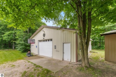 Nestled in an idyllic setting, this Barndominium home boasts on Lakes of the North Deer Run Golf Course in Michigan - for sale on GolfHomes.com, golf home, golf lot