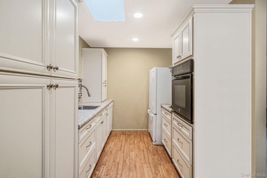 This beautifully maintained Greenbriar model is located in a on Leisure Village Golf Course in New York - for sale on GolfHomes.com, golf home, golf lot