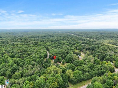 Nestled in an idyllic setting, this Barndominium home boasts on Lakes of the North Deer Run Golf Course in Michigan - for sale on GolfHomes.com, golf home, golf lot