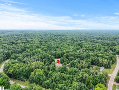 Nestled in an idyllic setting, this Barndominium home boasts on Lakes of the North Deer Run Golf Course in Michigan - for sale on GolfHomes.com, golf home, golf lot