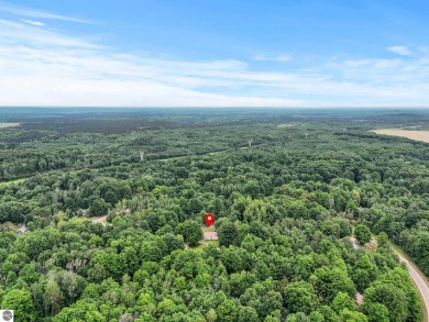 Nestled in an idyllic setting, this Barndominium home boasts on Lakes of the North Deer Run Golf Course in Michigan - for sale on GolfHomes.com, golf home, golf lot