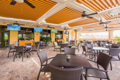 Discover the epitome of luxury living in this rarely available on Ibis Golf and Country Club in Florida - for sale on GolfHomes.com, golf home, golf lot