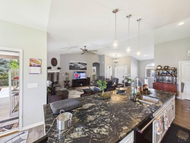 Welcome to this stunning ranch-style home overlooking the golf on Desert Hawk At Pueblo West in Colorado - for sale on GolfHomes.com, golf home, golf lot