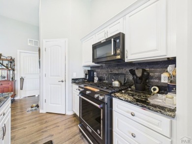 Welcome to this stunning ranch-style home overlooking the golf on Desert Hawk At Pueblo West in Colorado - for sale on GolfHomes.com, golf home, golf lot